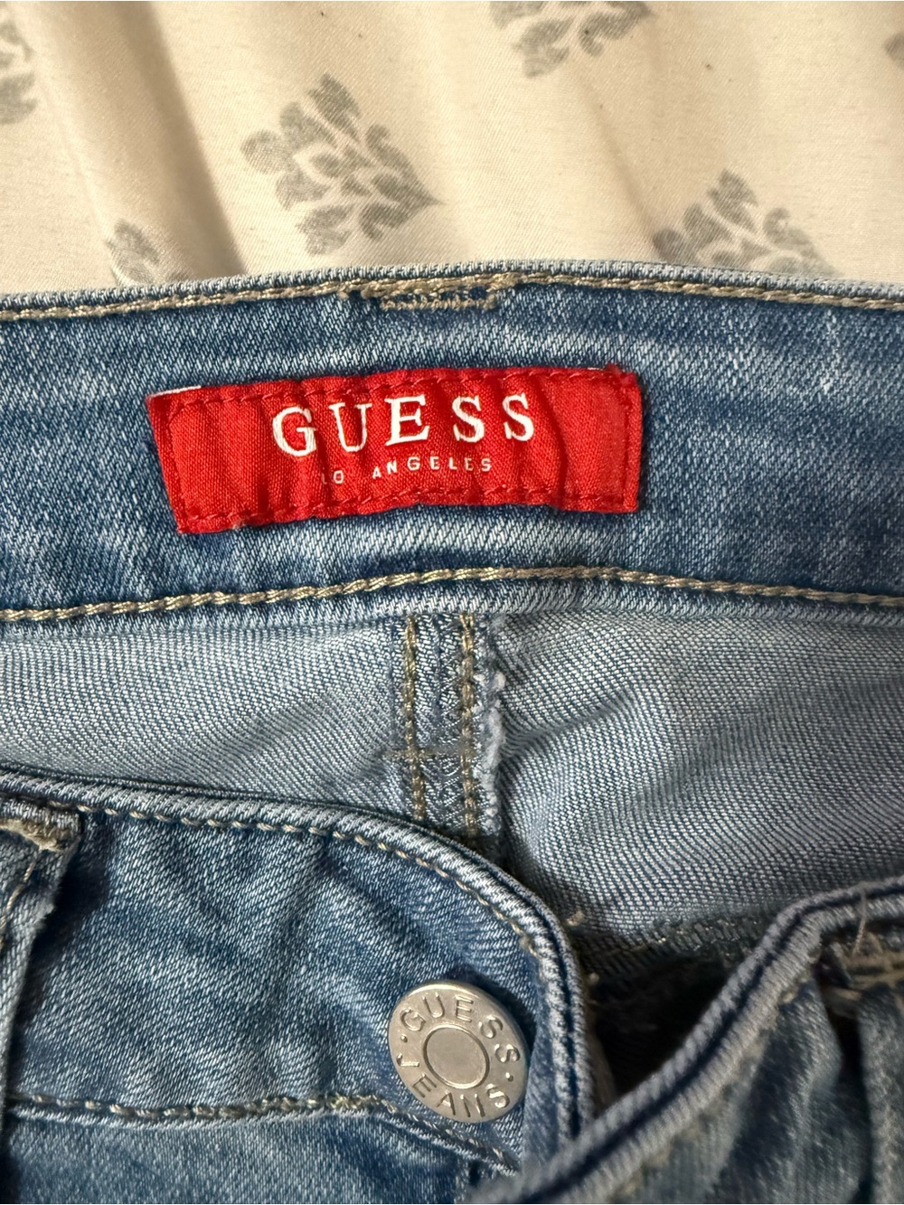 GUESS Light Blue Denim Women’s Jeans with Red Logo Tag